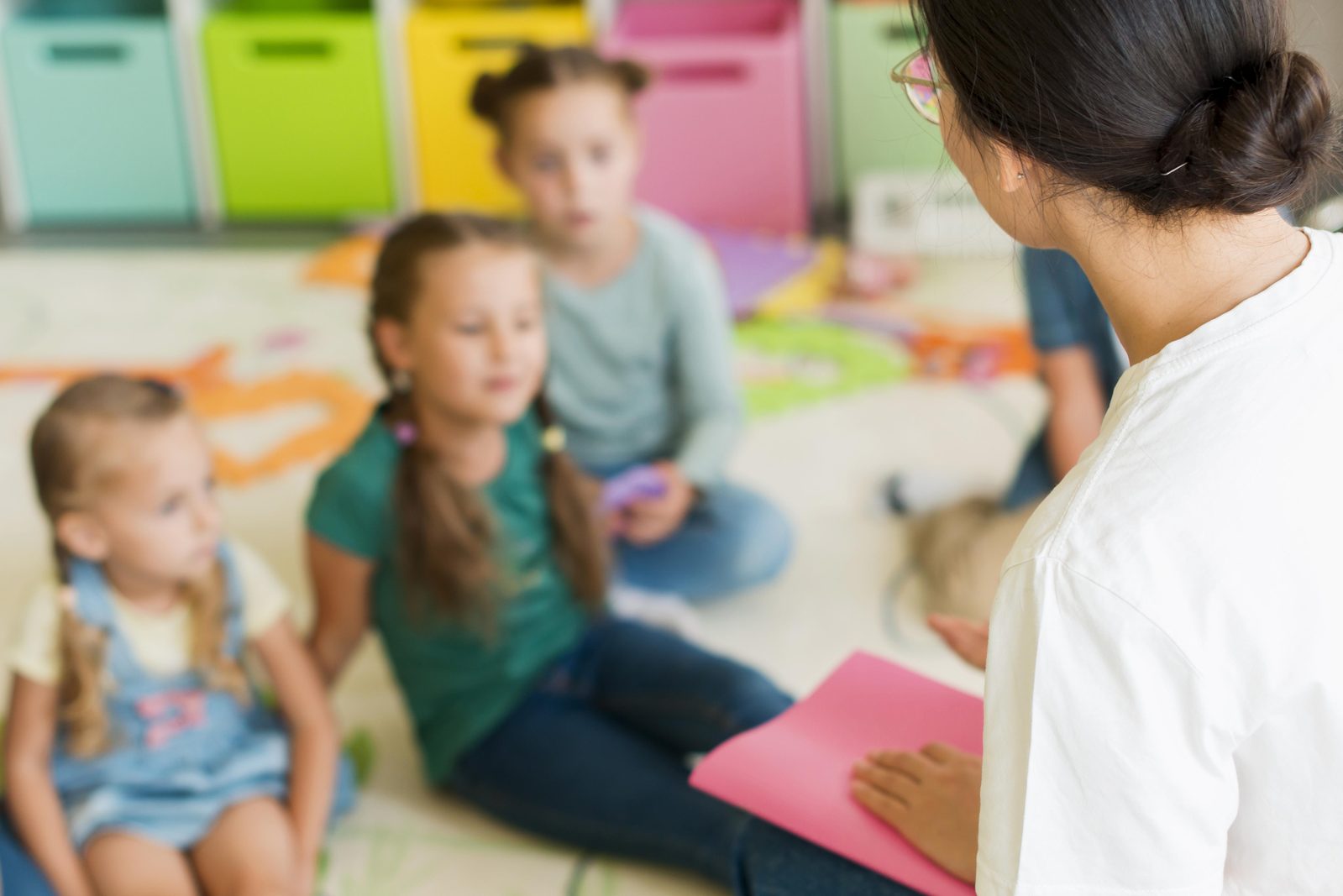Pre-K classroom with alphabet rug and learning centers