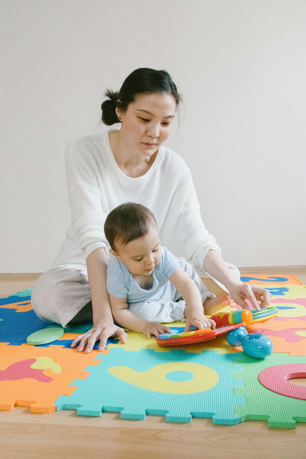 Welcoming infant room with colorful play areas